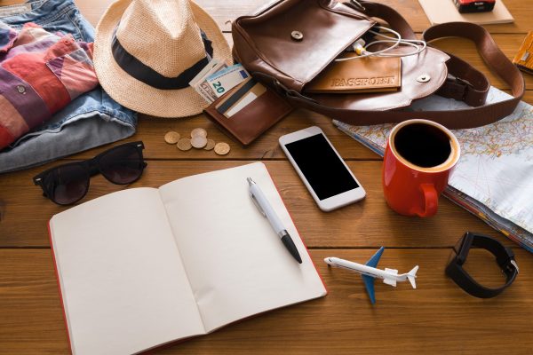 set-of-travel-things-on-wooden-background.jpg